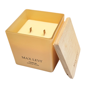 Max Levi Premium Creamy VAnilla Candle with wooden lid open resting beside the jar
